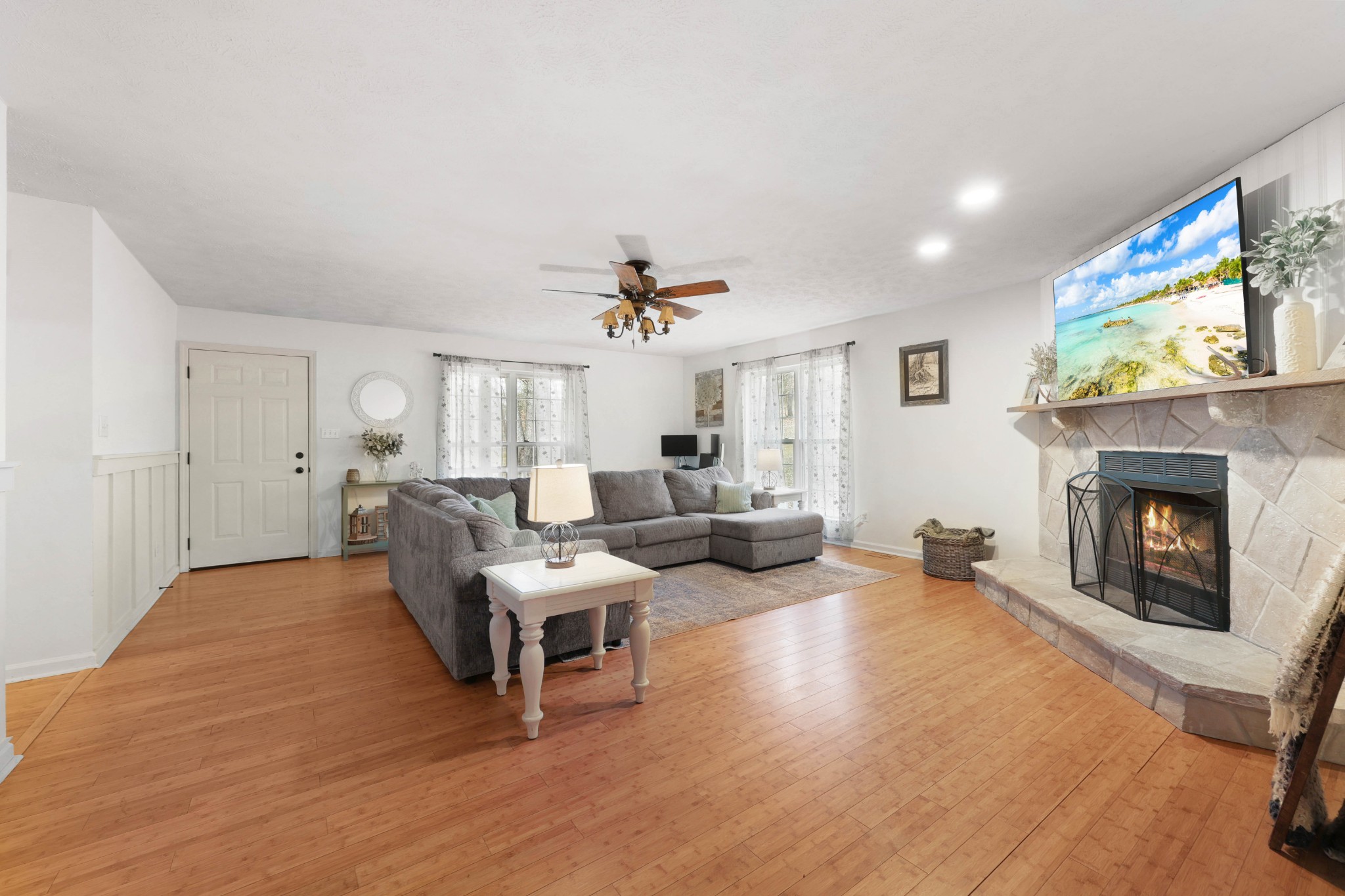 1201 Gallion Road Cumberland Furnace, TN 37051 - Photo 6 of 29 a living room with furniture and a fireplace
