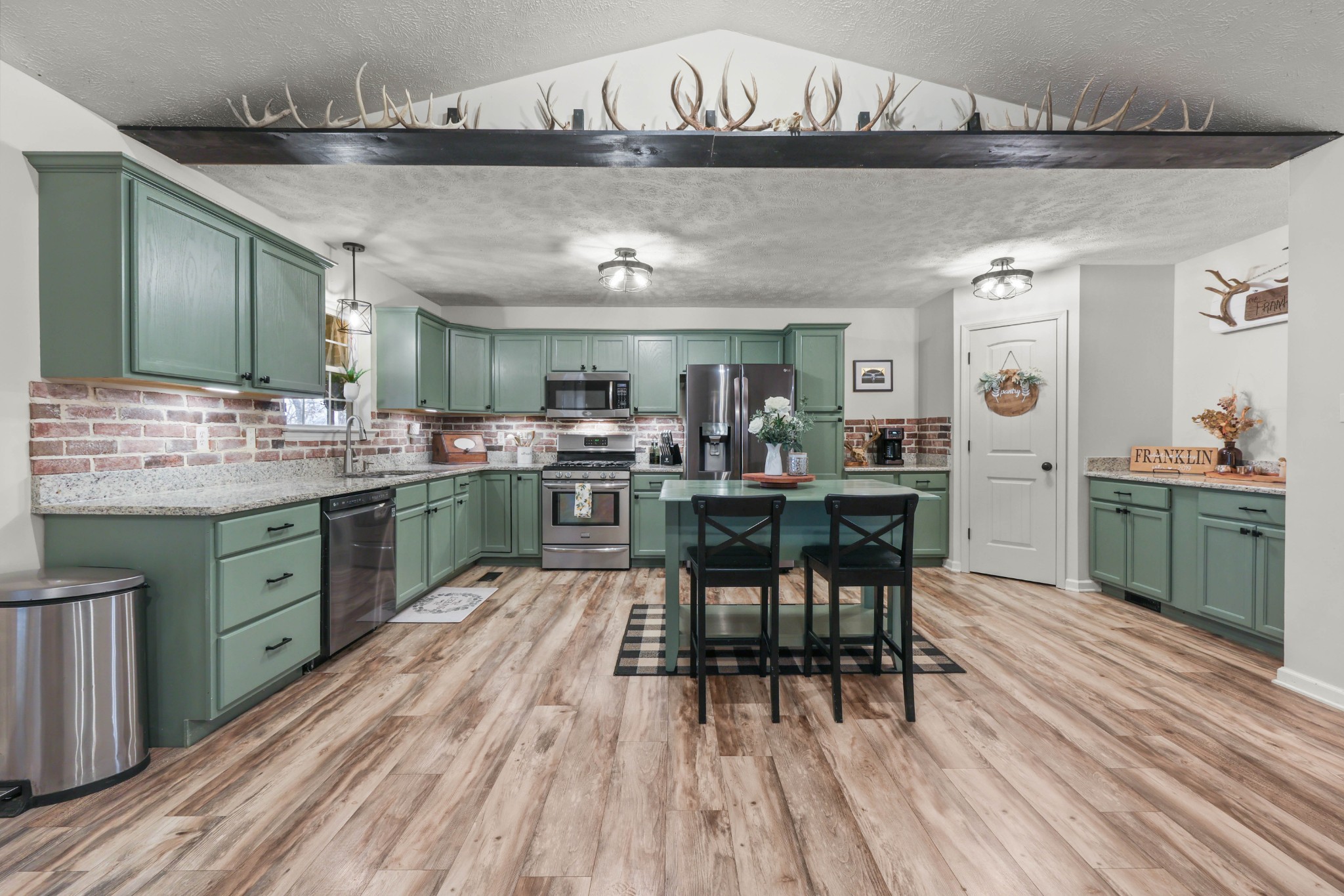 1201 Gallion Road Cumberland Furnace, TN 37051 - Photo 8 of 29 a kitchen with a sink and cabinets