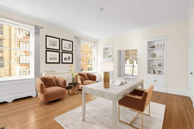 a spacious bedroom with a large bed and a large window