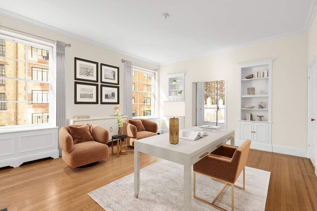 435 East 52nd Street, Unit 3A Manhattan, NY 10022 - Photo 9 of 35 a living room with furniture and a window