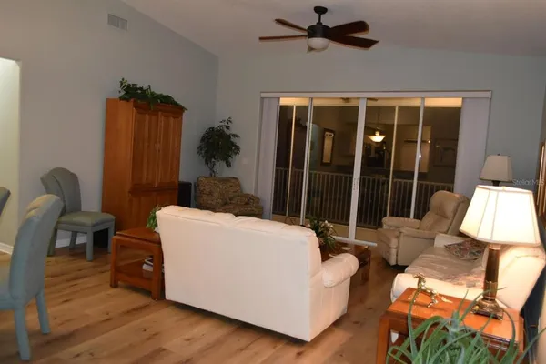 a living room with furniture and a window