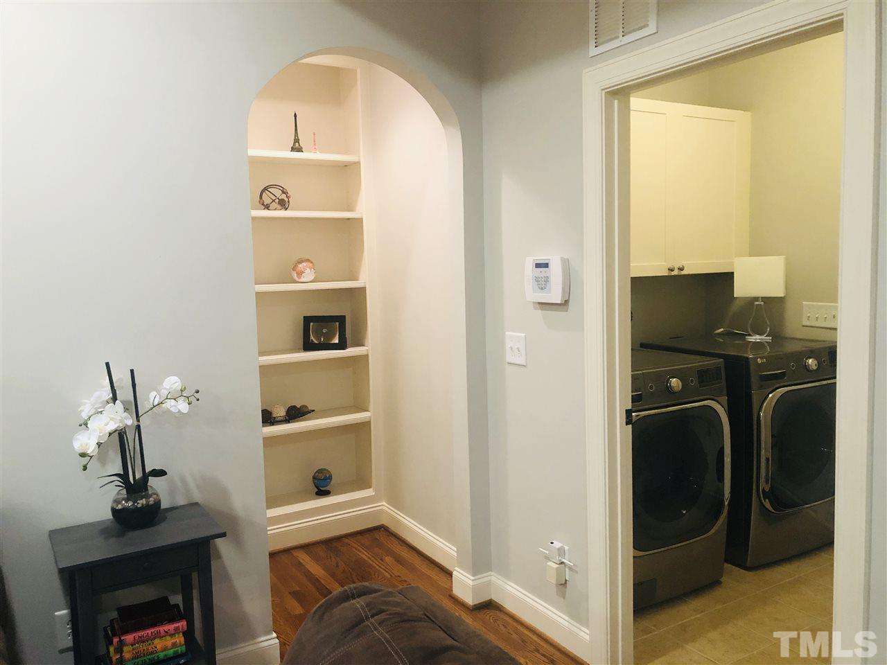9328 Tabriz Point Raleigh, NC 27614 - Photo 8 of 29 a view of hallway with washer and dryer