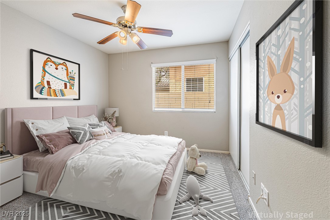 8878 Haviland Road Las Vegas, NV 89123 - Photo 35 of 58 Virtually Staged Bedroom featuring carpet, a closet, and ceiling fan