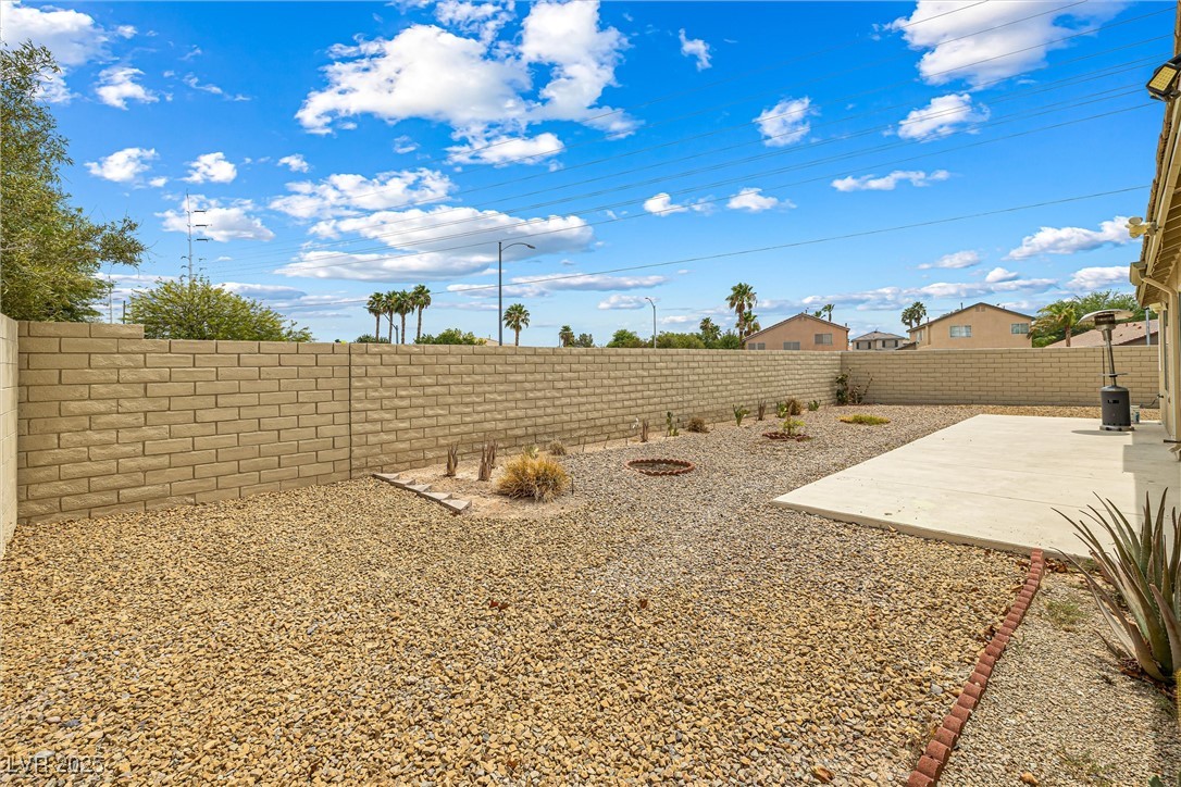 8878 Haviland Road Las Vegas, NV 89123 - Photo 41 of 58 Fenced backyard featuring a patio