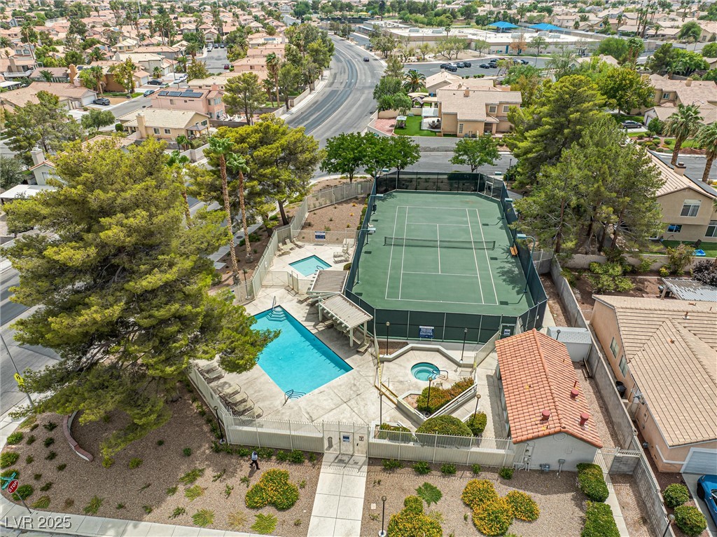 8878 Haviland Road Las Vegas, NV 89123 - Photo 50 of 58 Aerial perspective of suburban area with a pool