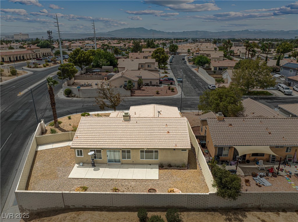 8878 Haviland Road Las Vegas, NV 89123 - Photo 52 of 58 Aerial view of residential area featuring mountains