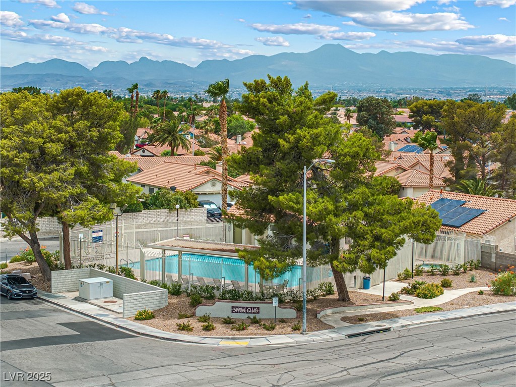 8878 Haviland Road Las Vegas, NV 89123 - Photo 54 of 58 Aerial perspective of suburban area with a mountain backdrop