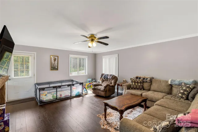 a very nice looking kitchen with a large window