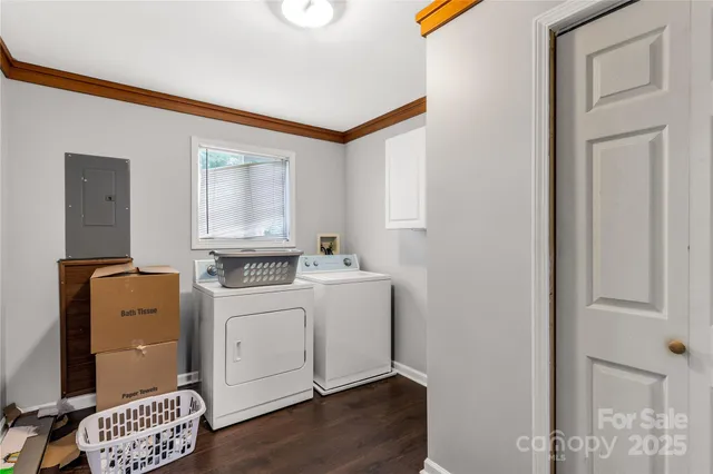 a bedroom with a bed and cabinets