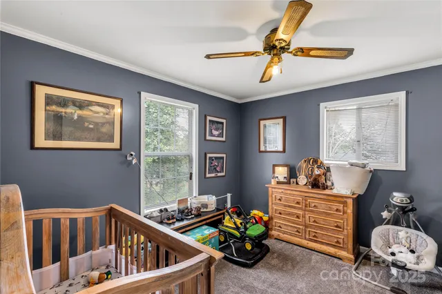 a bedroom with furniture and a window