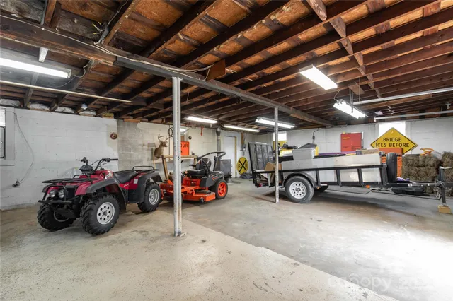 a view of a garage with a table and chairs
