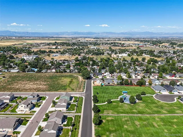 an aerial view of a city with lots of buildings
