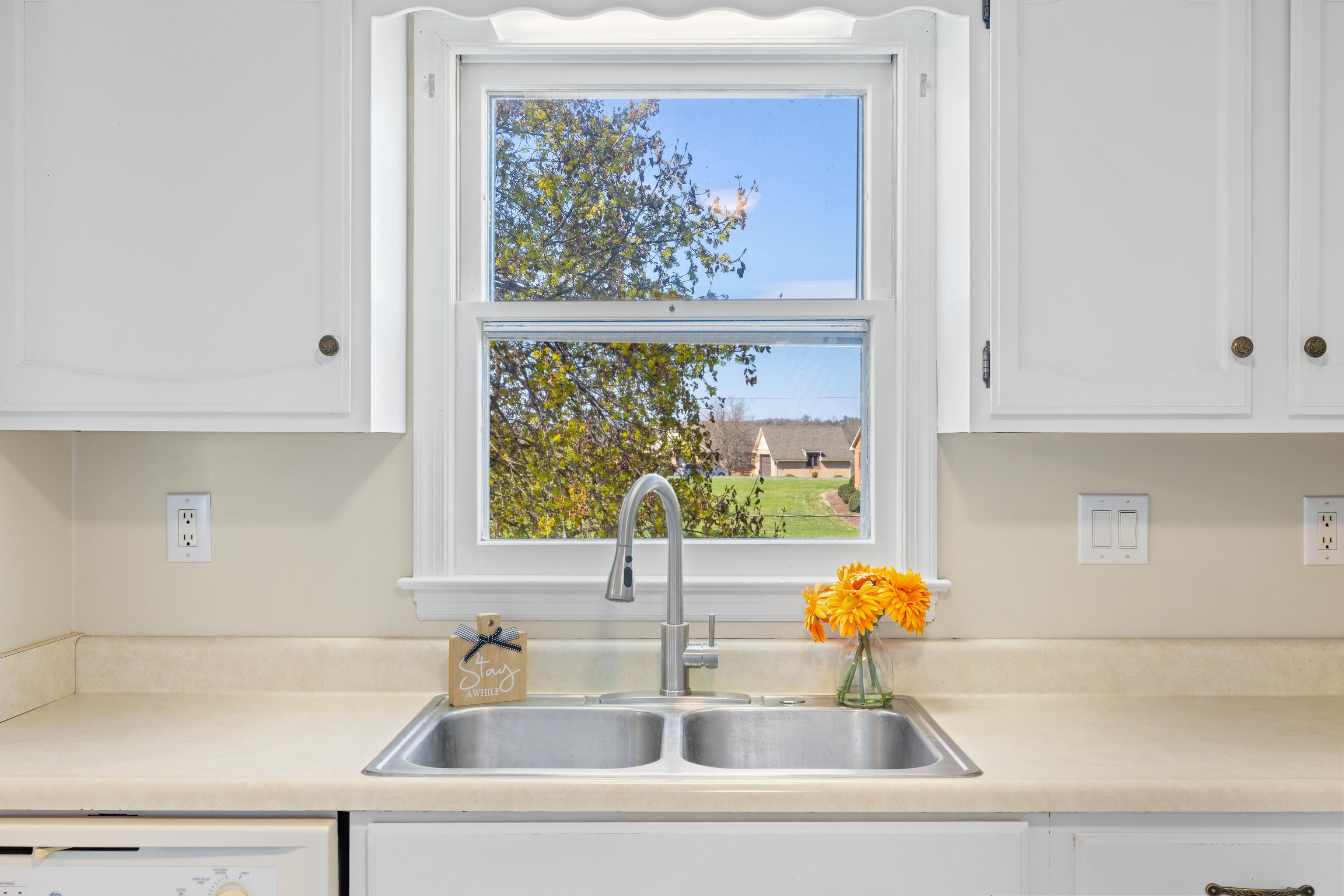 169 Mill Stone Drive Verona, VA 24482 - Photo 15 of 54 a kitchen with a sink and a window
