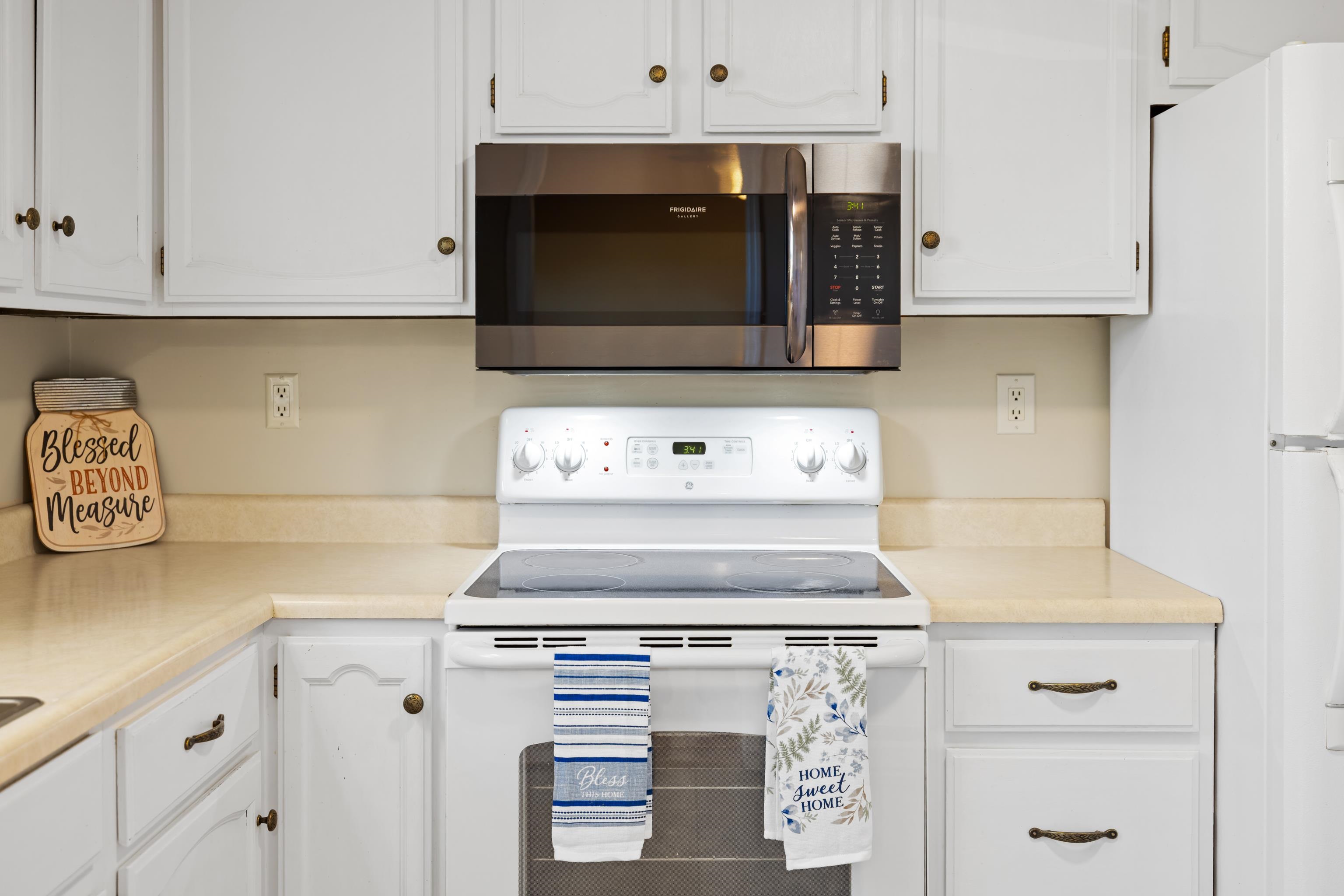 169 Mill Stone Drive Verona, VA 24482 - Photo 16 of 54 a stove top oven sitting inside of a kitchen