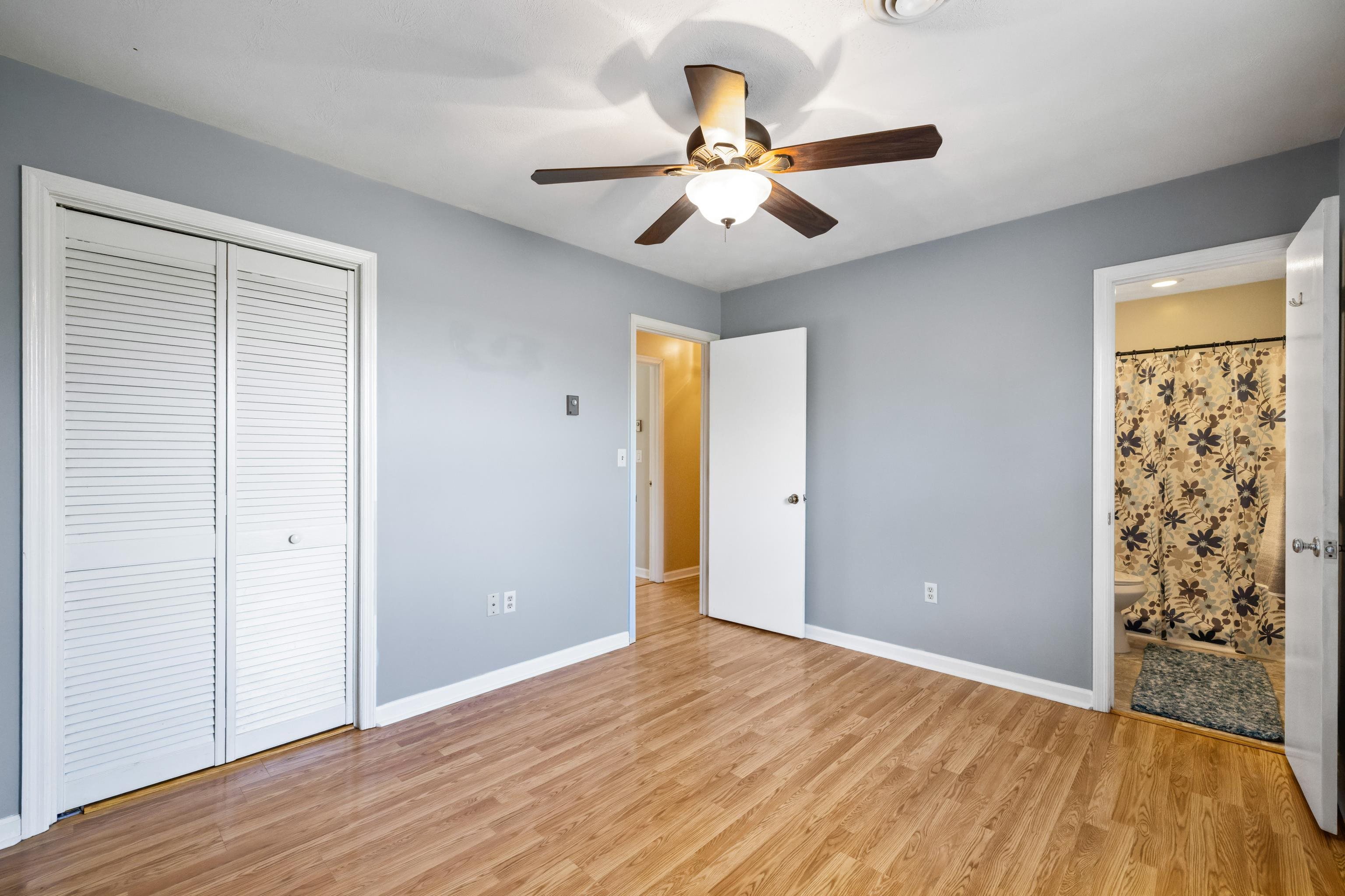 169 Mill Stone Drive Verona, VA 24482 - Photo 21 of 54 a view of an empty room with wooden floor and a window