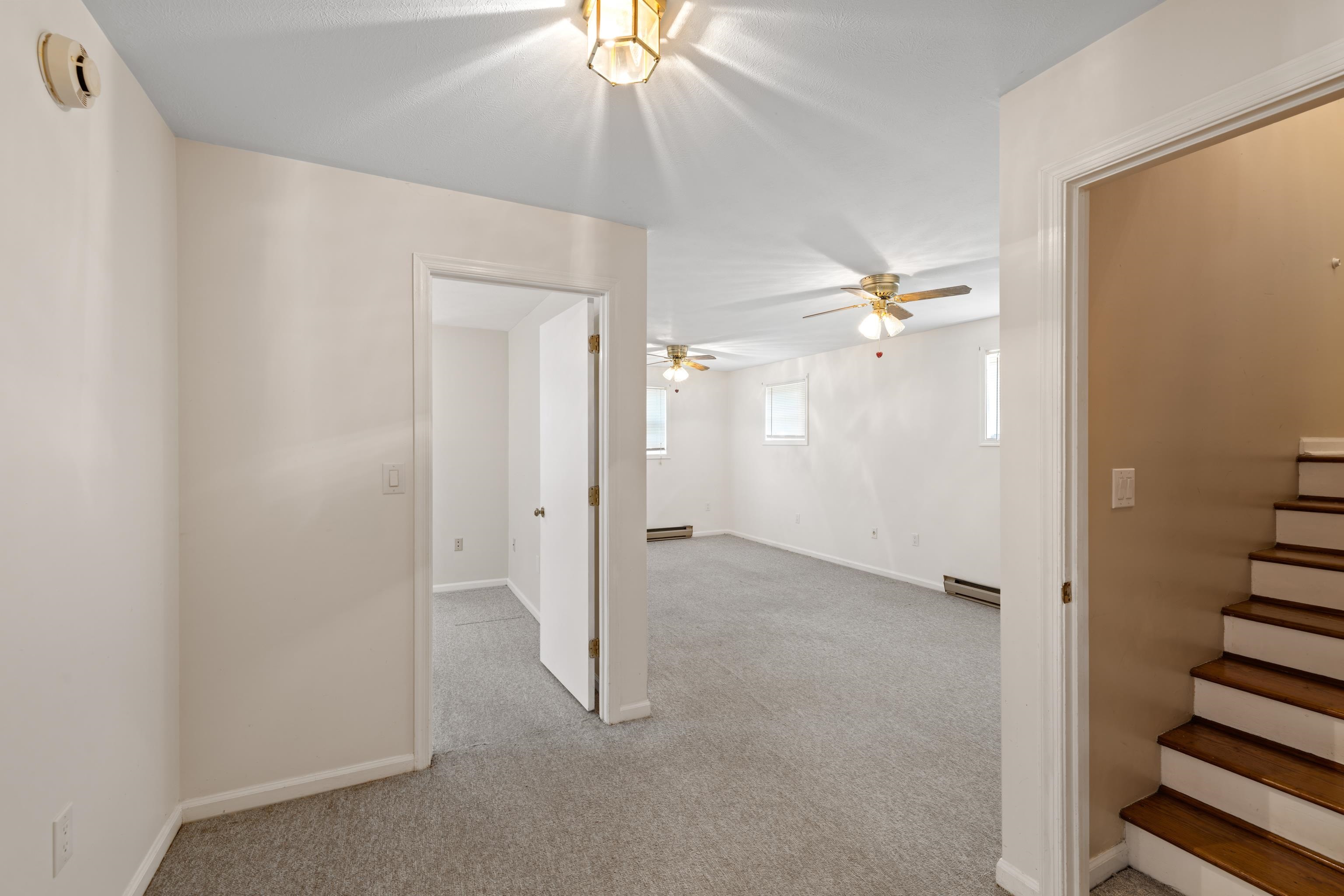169 Mill Stone Drive Verona, VA 24482 - Photo 30 of 54 an empty room with a ceiling fan and shower