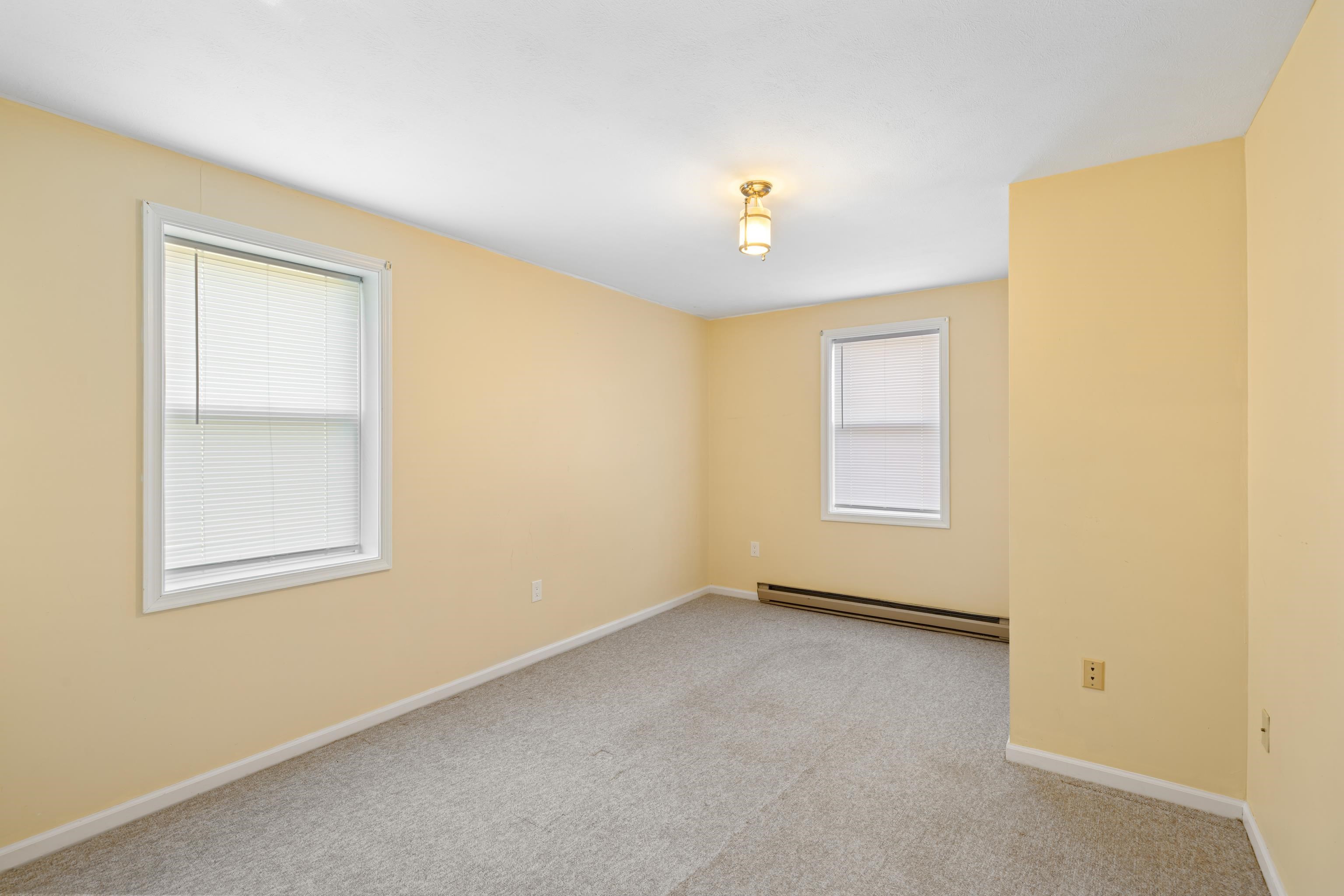 169 Mill Stone Drive Verona, VA 24482 - Photo 33 of 54 an empty room with windows