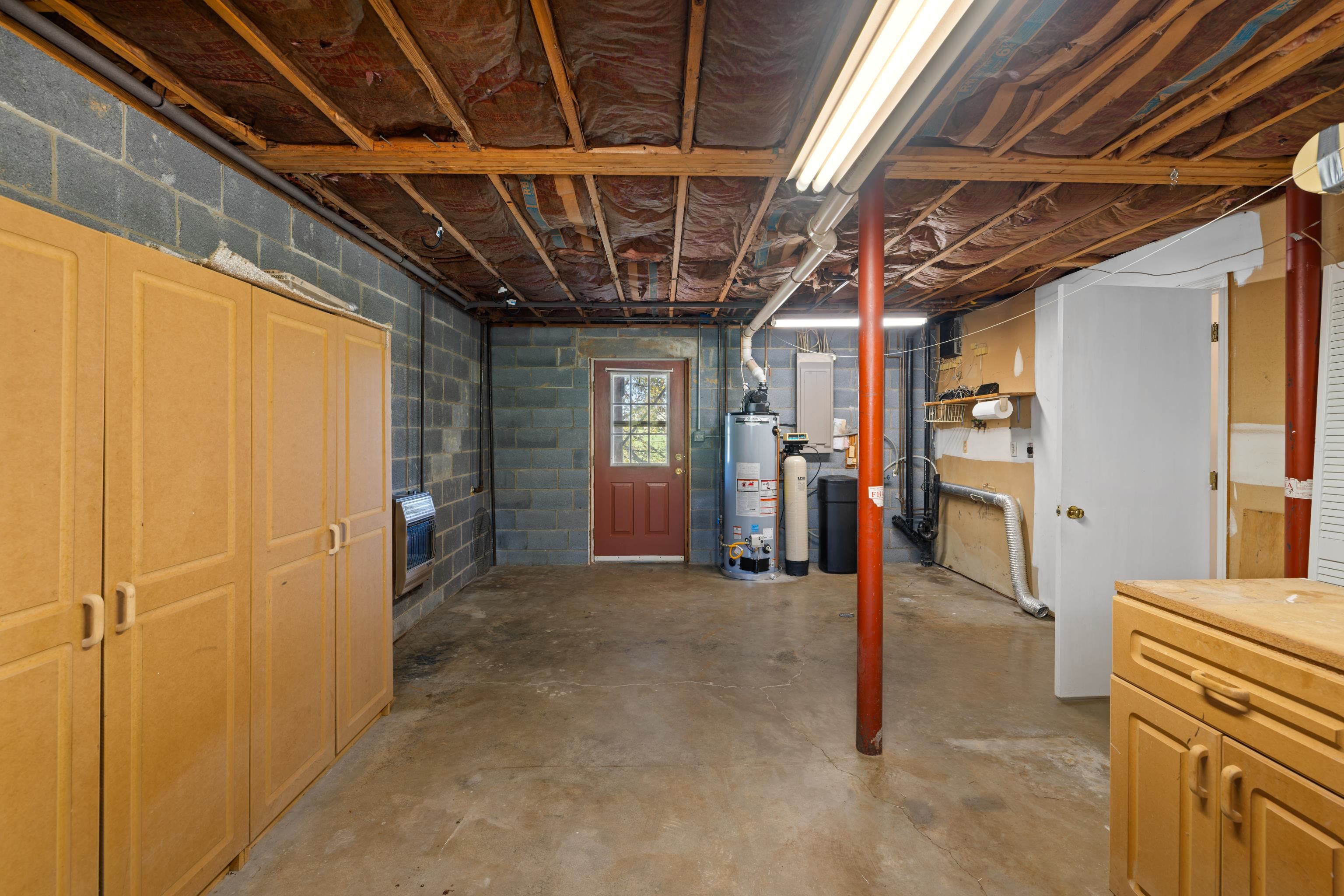 169 Mill Stone Drive Verona, VA 24482 - Photo 36 of 54 a view of a hallway with wooden cabinets