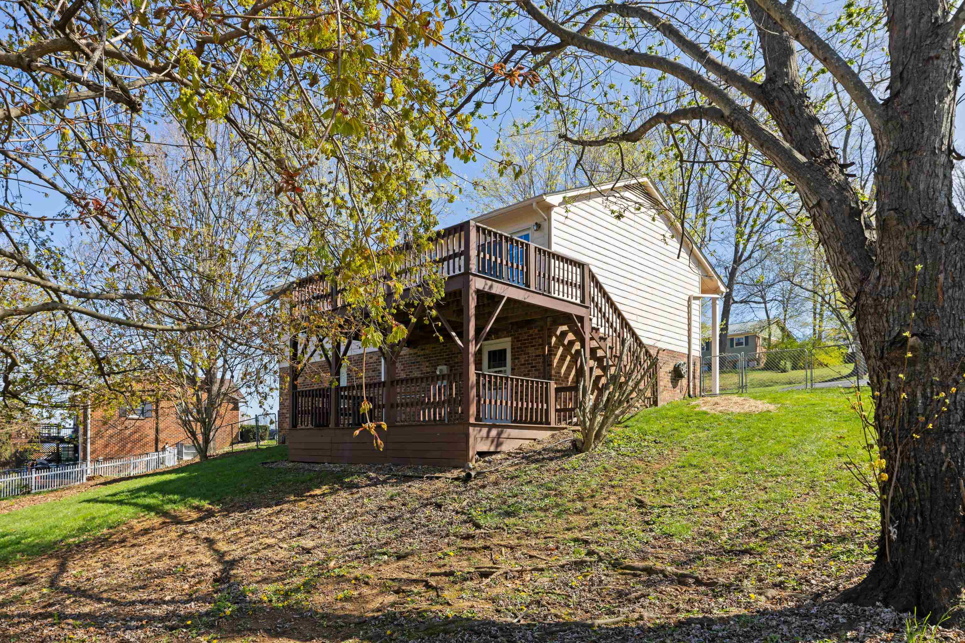 169 Mill Stone Drive Verona, VA 24482 - Photo 41 of 54 a view of a yard with plants and large trees