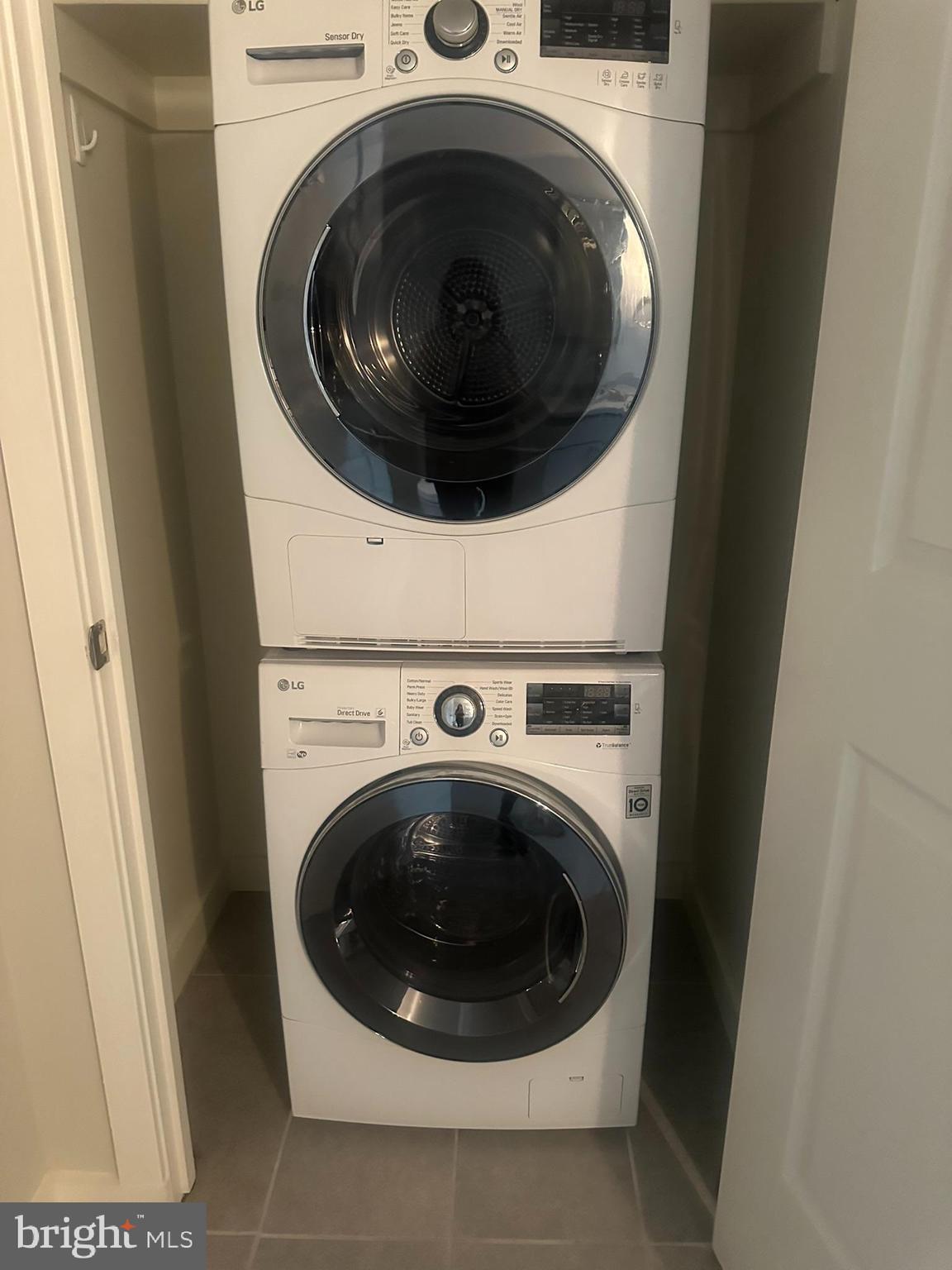 1025 First Street Southeast, Unit 901 Washington, DC 20003 - Photo 19 of 56 a close up view of a washer and dryer