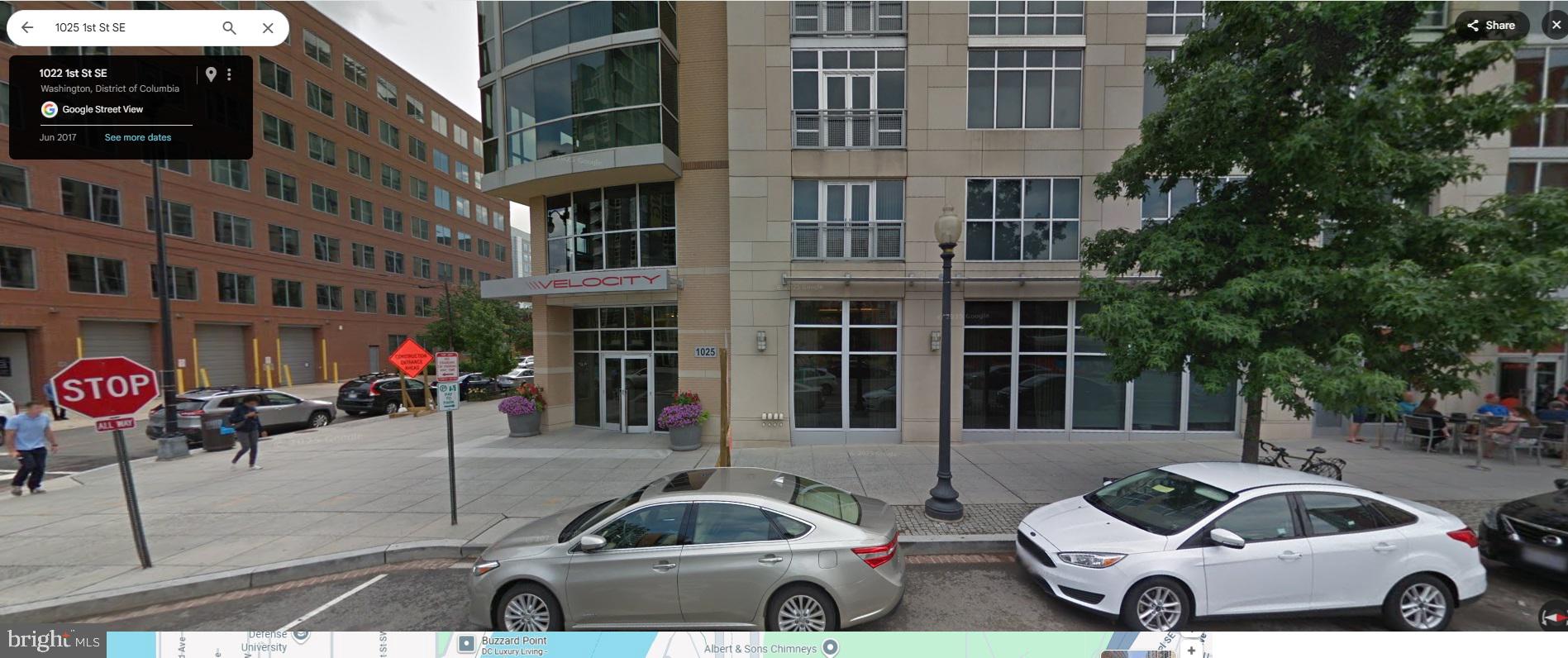 1025 First Street Southeast, Unit 901 Washington, DC 20003 - Photo 3 of 56 a front view of a building with parking space