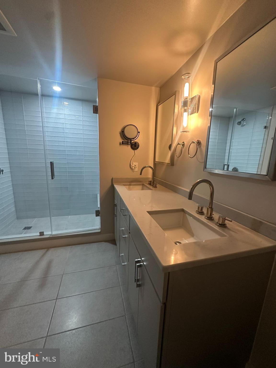 1025 First Street Southeast, Unit 901 Washington, DC 20003 - Photo 32 of 56 a bathroom with a sink toilet and shower