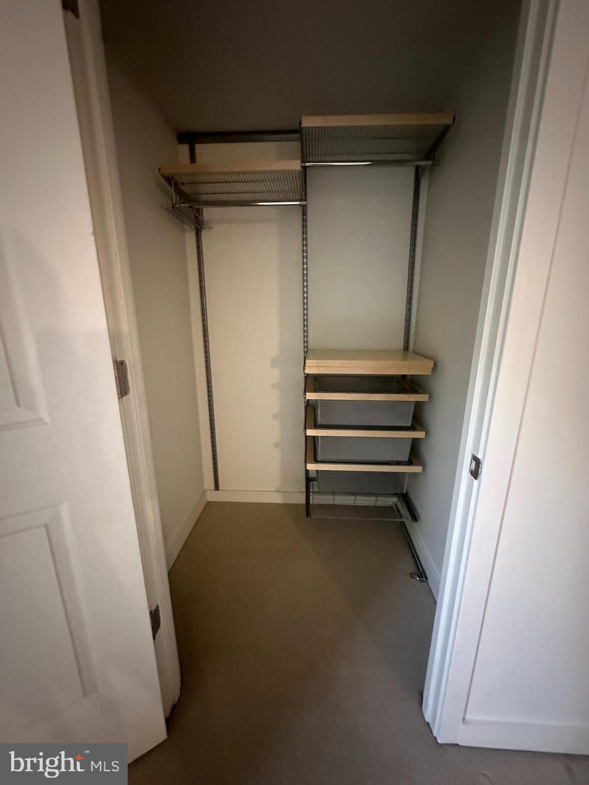 1025 First Street Southeast, Unit 901 Washington, DC 20003 - Photo 33 of 56 a view of room with stairs and a window