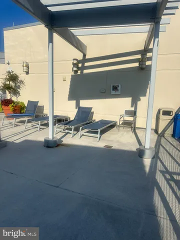 a view of a balcony with wooden floor