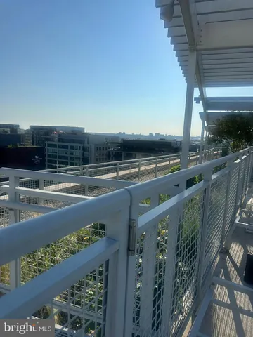 a view of a balcony with an ocean view