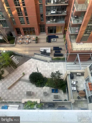 a bathroom with a shower and a sink