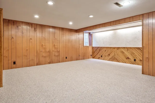 an empty room with furniture and closet