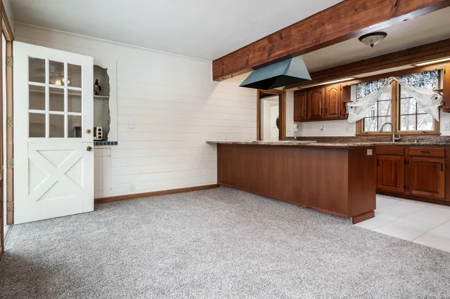 a view of a large room with a large window