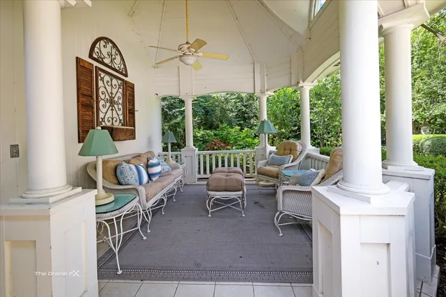 a kitchen with stainless steel appliances granite countertop a stove a kitchen island with a dining table and chairs