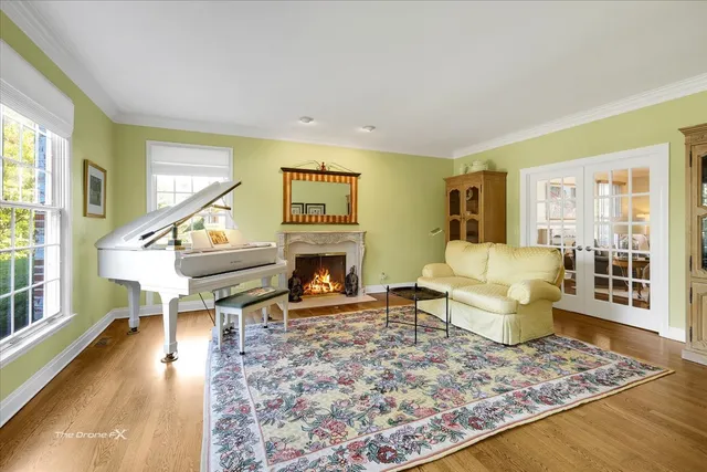 a spacious bathroom with a tub sink and mirror