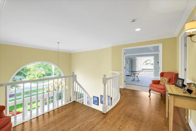 a bedroom with a large bed furniture and a window