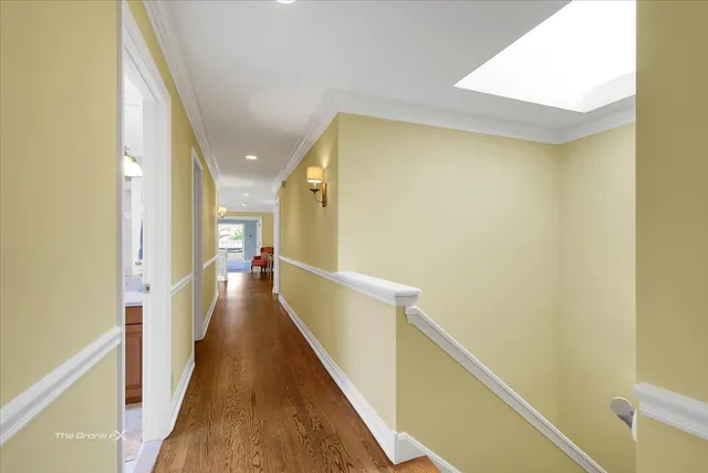 a bedroom with furniture and a baby crib