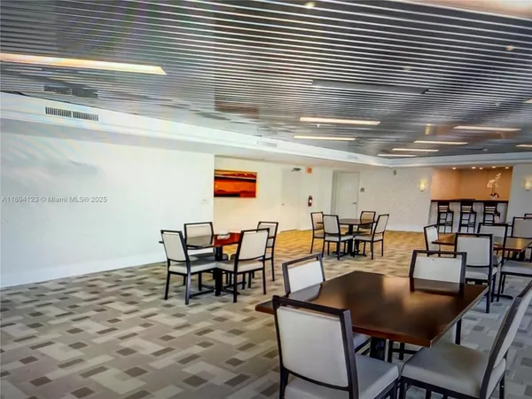 a view of a dining room with furniture