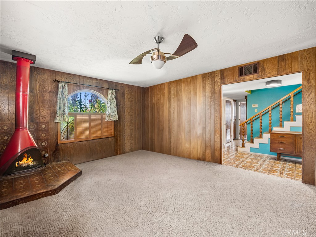 13916 Burning Tree Drive Victorville, CA 92395 - Photo 14 of 49 a view of a room with gym equipment