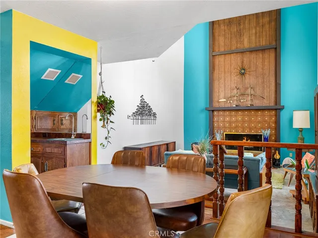 a bedroom with a bed and a table