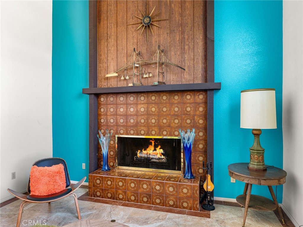 13916 Burning Tree Drive Victorville, CA 92395 - Photo 30 of 49 a living room with furniture and a fireplace