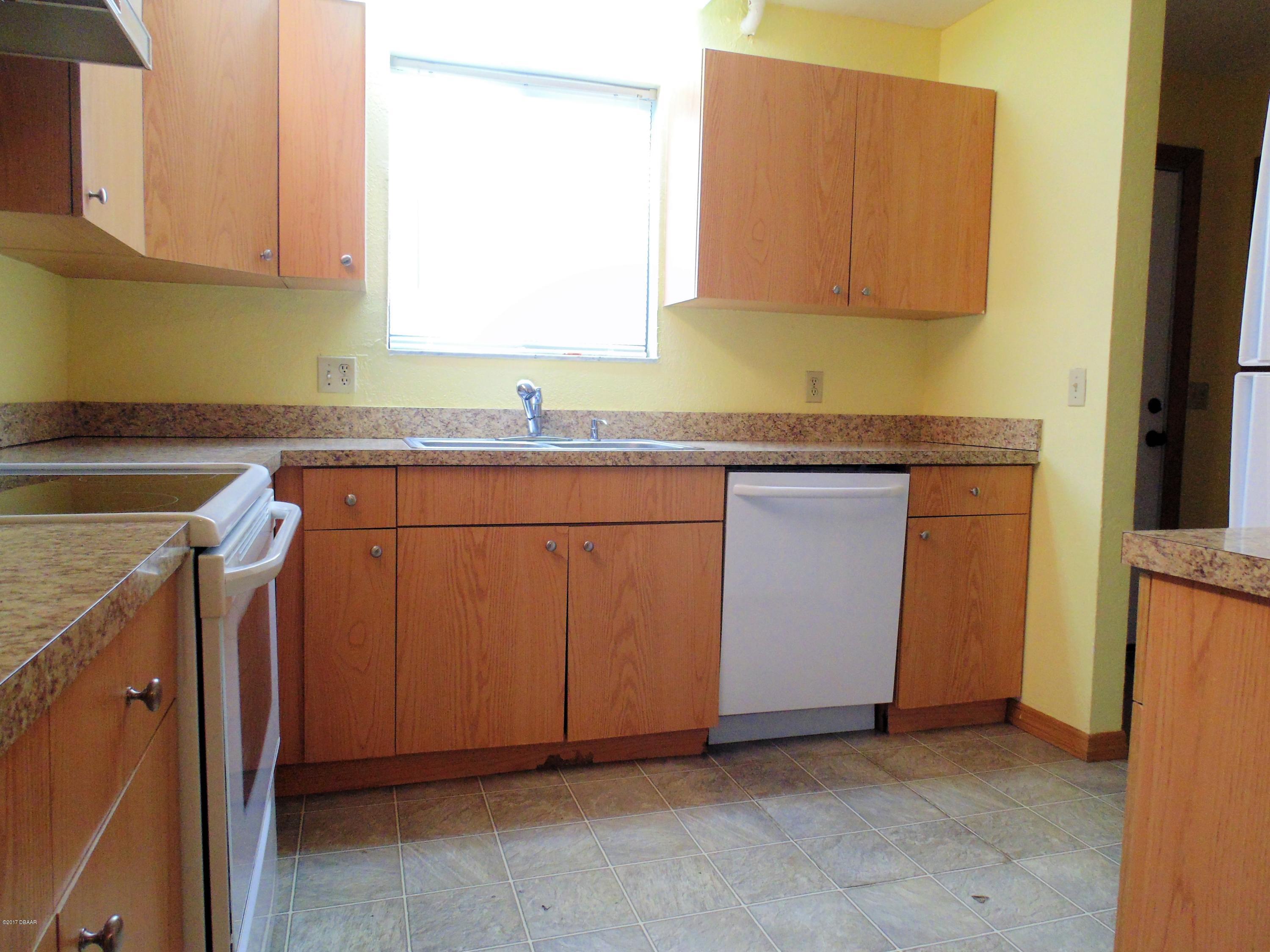 1103 Deer Springs Road Port Orange, FL 32129 - Photo 3 of 11 Kitchen 2