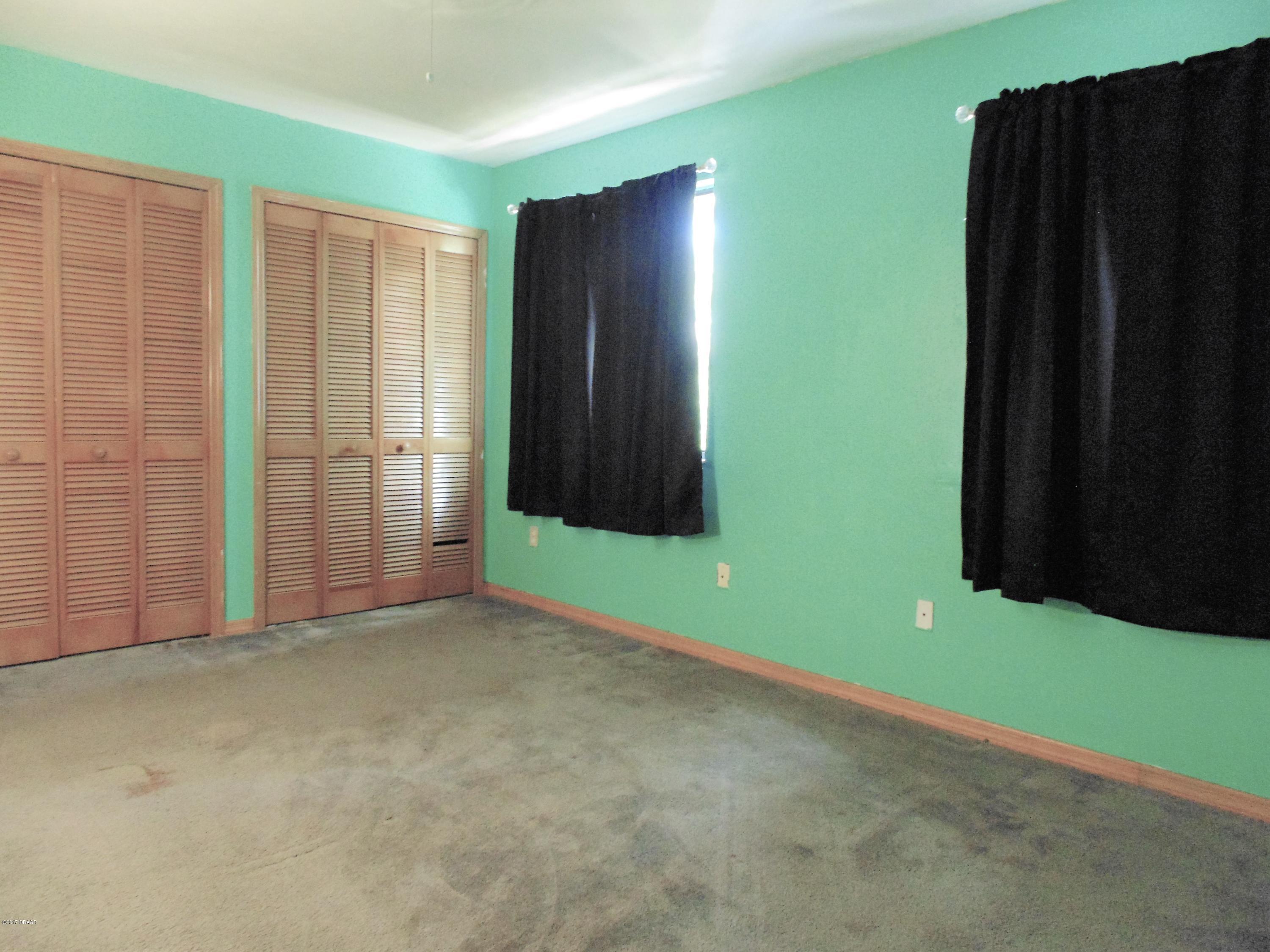 1103 Deer Springs Road Port Orange, FL 32129 - Photo 6 of 11 Master Bedroom