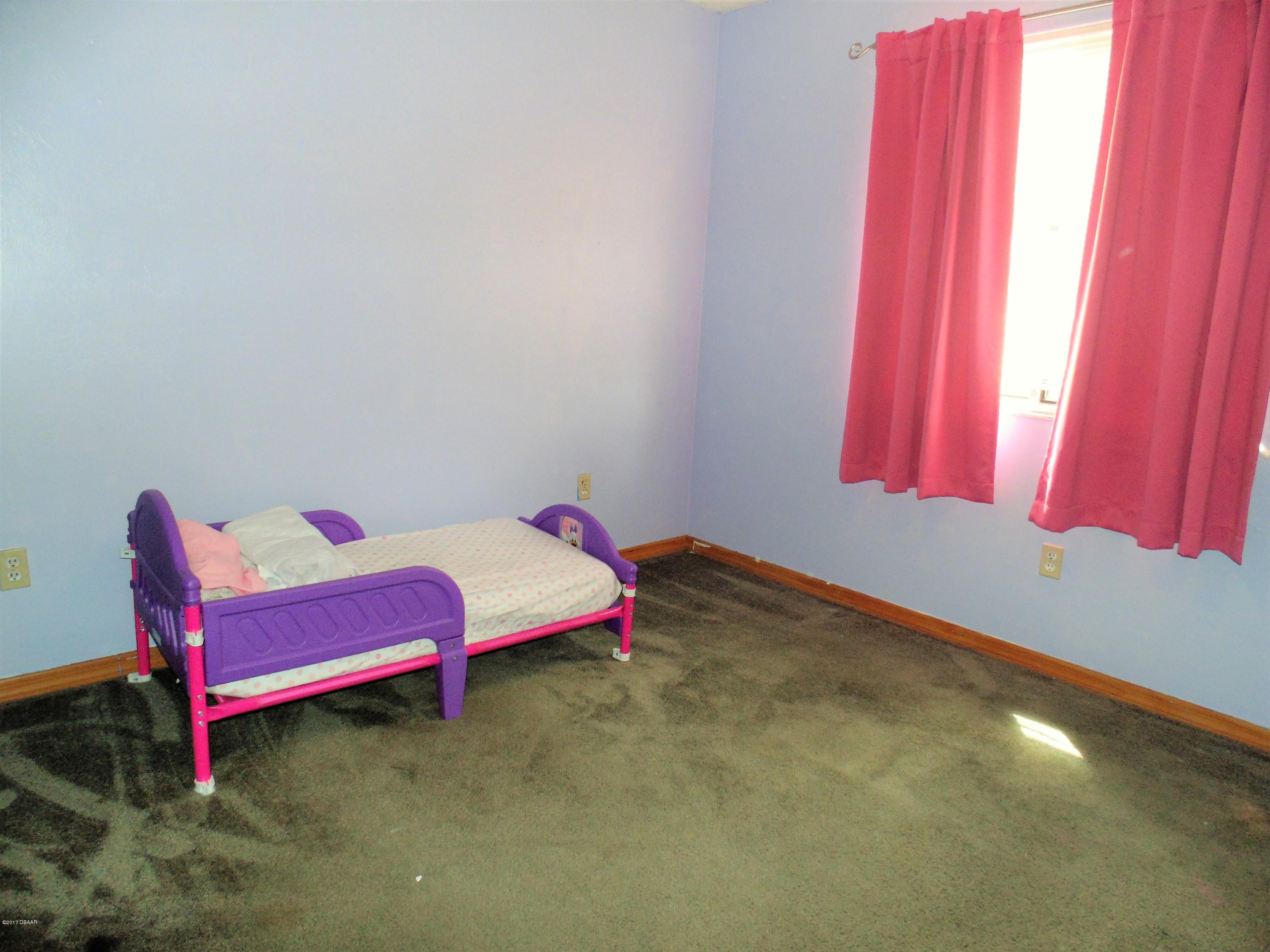 1103 Deer Springs Road Port Orange, FL 32129 - Photo 8 of 11 Guest Bed