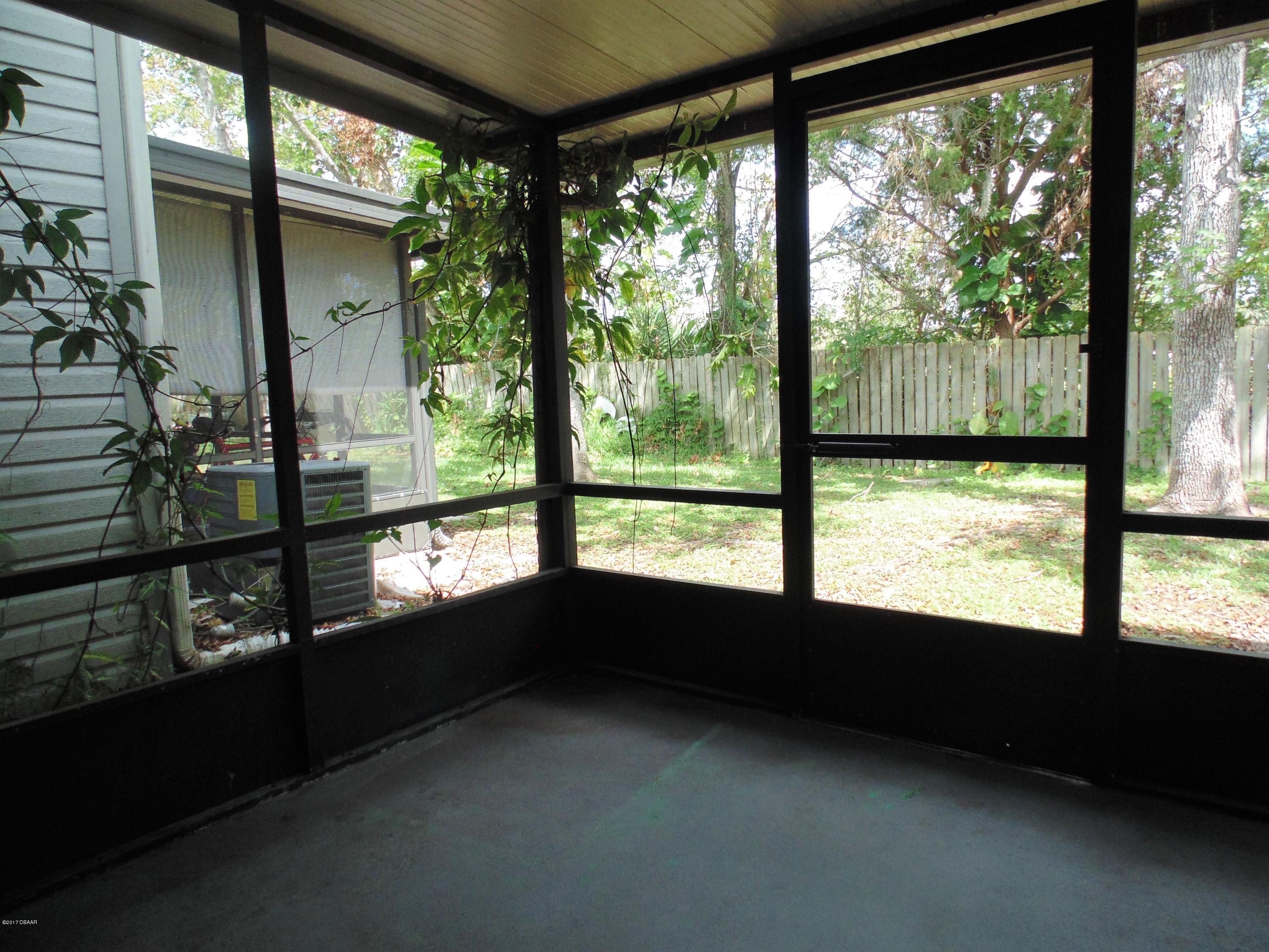 1103 Deer Springs Road Port Orange, FL 32129 - Photo 10 of 11 Screen Porch