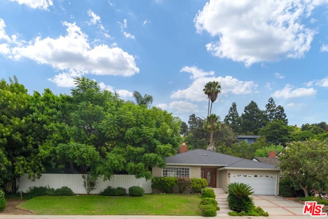 5712 Tellefson Road Culver City, CA 90230 - Photo 2 of 25 a view of a house with a yard and a garden