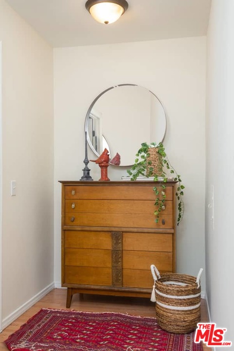 5712 Tellefson Road Culver City, CA 90230 - Photo 19 of 25 a bathroom with a sink and a mirror