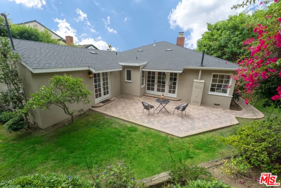 5712 Tellefson Road Culver City, CA 90230 - Photo 24 of 25 a view of a house with a yard and potted plants