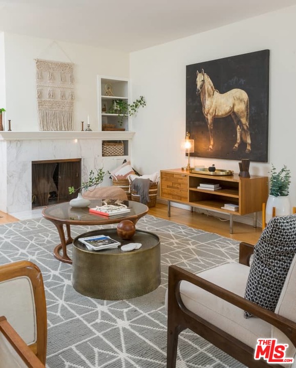 5712 Tellefson Road Culver City, CA 90230 - Photo 6 of 25 a living room with furniture and a fireplace