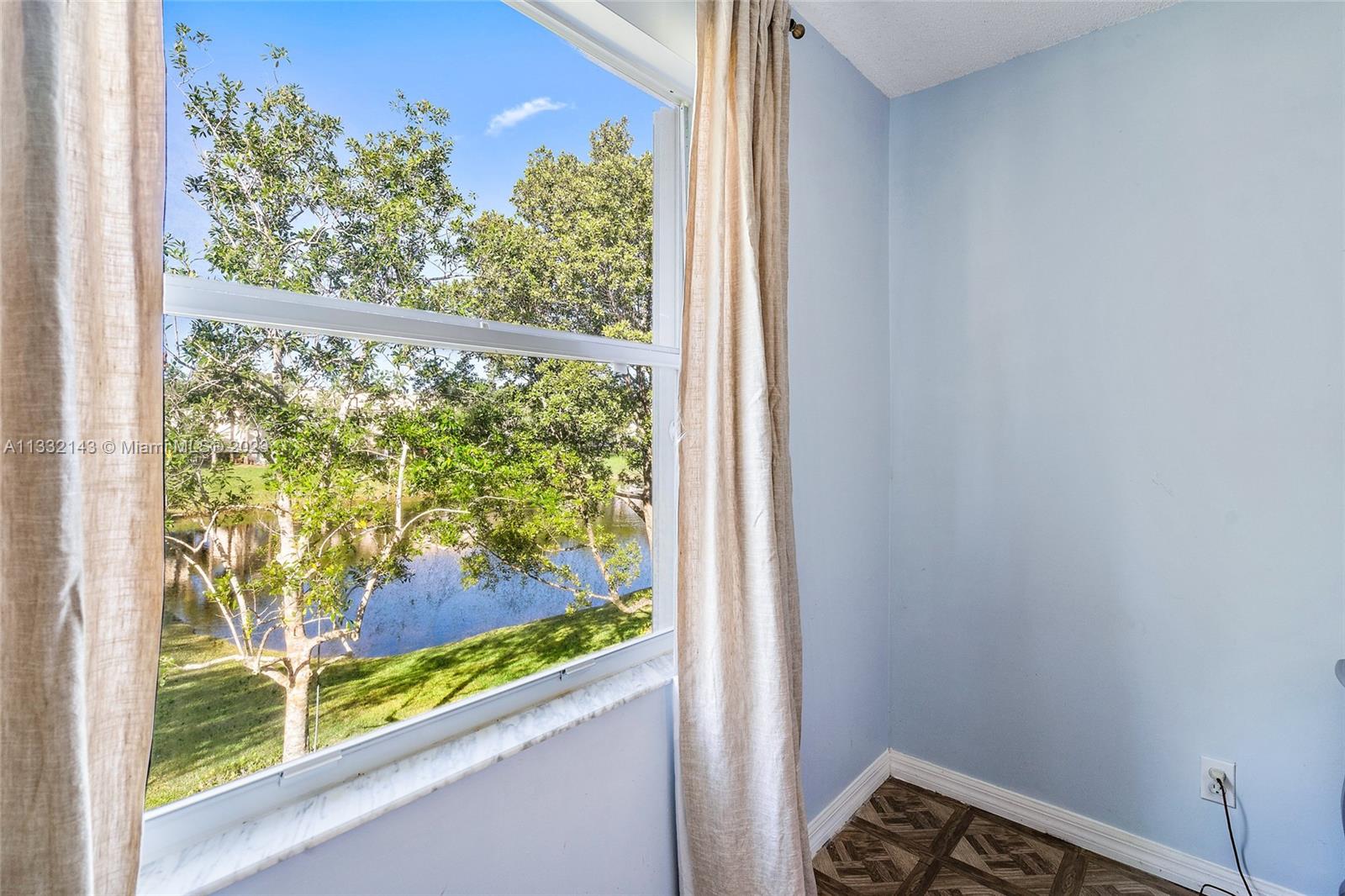 232 Timberwalk Trail Jupiter, FL 33458 - Photo 13 of 33 a view of a window in a room