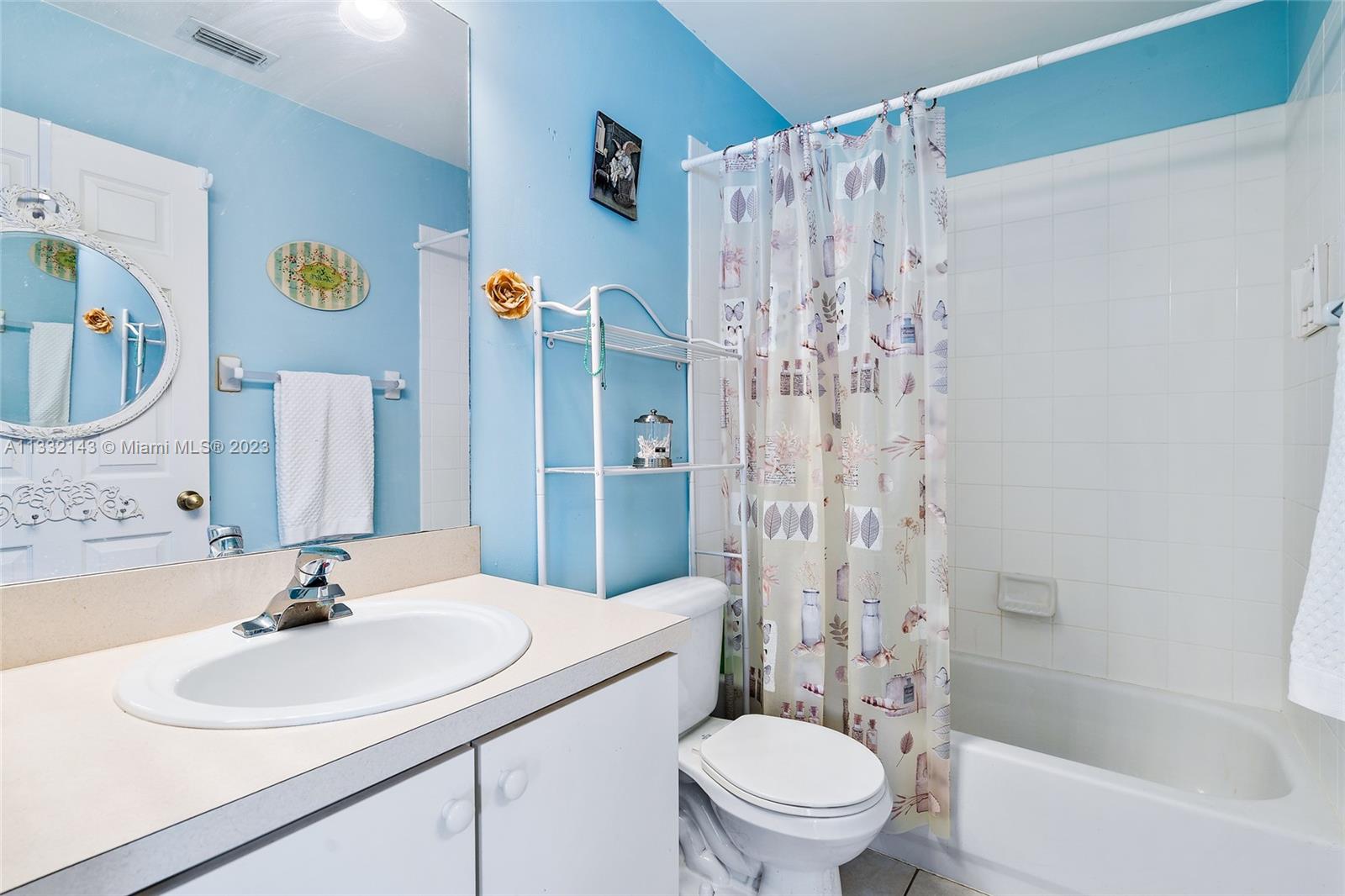 232 Timberwalk Trail Jupiter, FL 33458 - Photo 17 of 33 a bathroom with a sink toilet and shower